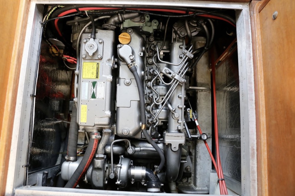 Yanmar 4JH2TE diesel engine in its engine room